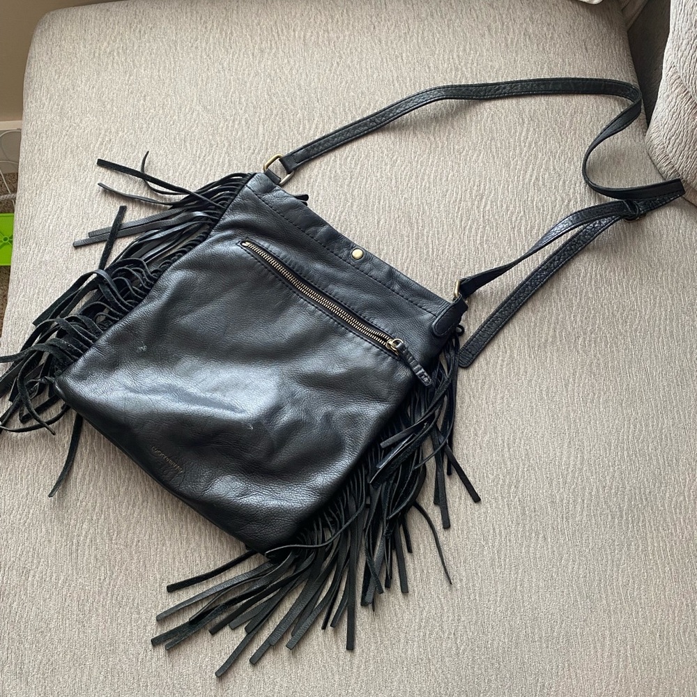 Lucky Brand leather fringe purse! This purse is very loved.